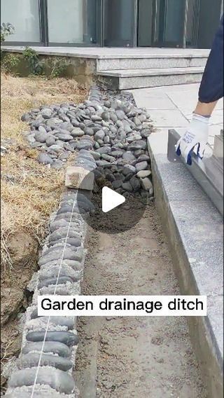 BaiYIDa on Instagram: "Garden drainage ditch" Diy Dry Creek Bed For Drainage, Drainage Ditch Landscaping, Gutter Drainage Ideas, Drainage Solutions Landscaping, Yard Drainage System, Rock Drainage, Garden Drainage, Downspout Drainage, Gutter Drainage