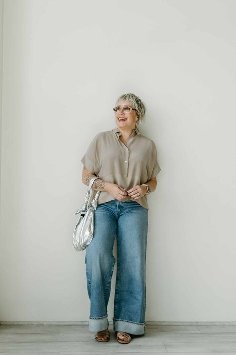 Little details like a big cuff on a jean, a little shine on a bag, a boxy breezy shirt instead of a fitted one…Simple but not boring. Full outfit details & how I'm styling these cuffed wide-leg jeans, on the blog. | #TheMomEditStyle #HowToStyleCuffedJeans #CuffedJeans #WideLegJeans #Agolde #OutfitInspo #OutfitIdeas #SpringStyle #SpringOutfit #StripedVest #DenimBag Wide Legged Jeans Outfit, Cuffed Jeans Outfit, Wide Cuff Jeans, How To Style Wide Leg Jeans, Wide Leg Jeans Outfits, Breezy Shirt, Style Wide Leg Jeans, Wide Leg Jeans Outfit, Cuff Jeans