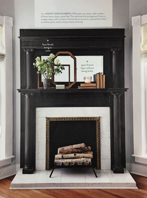 LOVE this fireplace surround, the stone and the wood that looks like it could be antique. The lines are still really clean to me and the black/white combo feels contemporary (which I suppose is what I like when I was saying modern at first). Black Fireplace Mantel, Wood Fireplace Surrounds, Antique Fireplace Surround, Fireplace Feature Wall, Antique Fireplace Mantels, Fireplace Update, Fireplace Mantle Decor, Black Fireplace, Victorian Fireplace