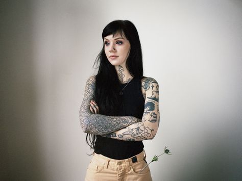 Maybe it’s her big violet eyes. It could be her trademark black hair and super-short, blunt fringe. Or the tattoos that adorn her temples and throat. Whichever part of Grace Neutral draws you in first, you quickly realize that her entire body is a visual expression of her beautiful soul.    A Grace Neutral Tattoo, Neutral Tattoo, Black Hair Fringe, Krista Keehus, Grace Neutral, Hair Fringe, Tattoo Prices, How To Be Graceful, Violet Eyes