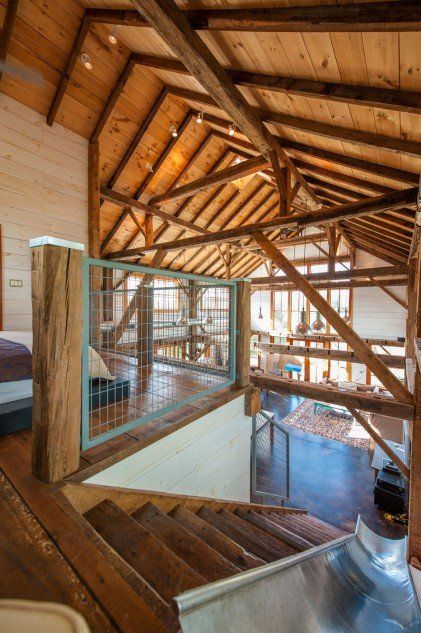 Restored Barn With Slide | POPSUGAR Home Loft With Slide, Barndo Interior, Barndominium Pictures, Affordable Barndominium, Barn Remodel, Stair Slide, Barndominium House, Barn Conversions, Barn Apartment