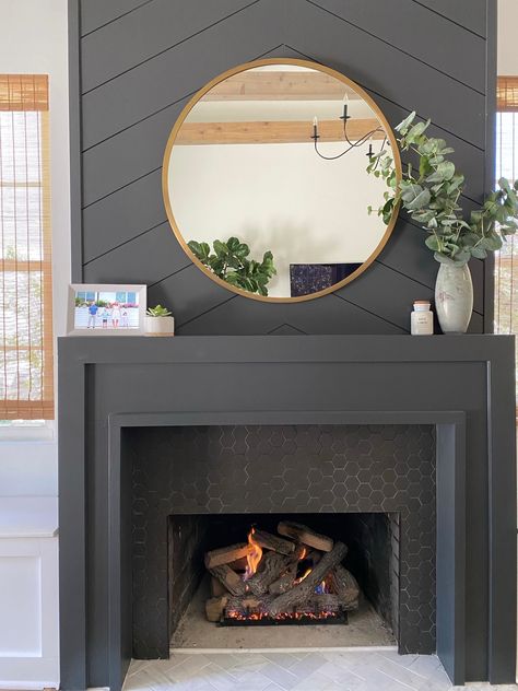 NEAT method- Simplified decor, dark mantle, mantle decor, family room, fireplace gray, brass mirror, round mirror, painted mantle, home design, modern design, digital frame, organization Contrasting Fireplace Wall, Hanging Lights Above Fireplace, Dark Grey Mantle, Framed Out Fireplace, Charcoal Mantle, Dark Gray Painted Fireplace, Modernizing Fireplace, Dark Gray Mantle, Slate Gray Fireplace