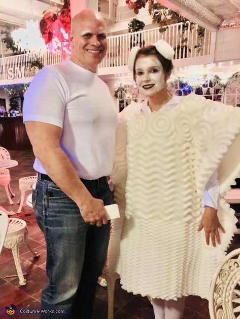 Brandy: My husband is mr clean and I’m the magic eraser. Idea was mine. I had to get a twin mattress pad that resembled a magic easer. I cut a whole... Mr Clean Halloween Costume Couples, Mr Clean Couples Costume, Mr Clean Halloween Costume, Mr Clean Costume, Original Costume Ideas, Unique Couples Costumes, Flintstones Costume, Fire Costume, Couples Halloween Costumes