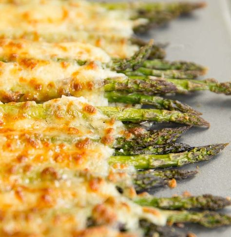 Cheesy Baked Asparagus is the perfect no-fuss side dish. With just 4 ingredients and 15mins to make, you'll be serving this Asparagus with just about everything! #cheese #cheesy #asparagus #sidedish | www.dontgobaconmyheart.co.uk Asparagus With Cheese, Cheesy Baked Asparagus, Garlic Asparagus, Asparagus Recipes Oven, Asparagus Recipes Baked, Parmesan Asparagus, Baked Asparagus, Fresh Asparagus, Roasted Asparagus