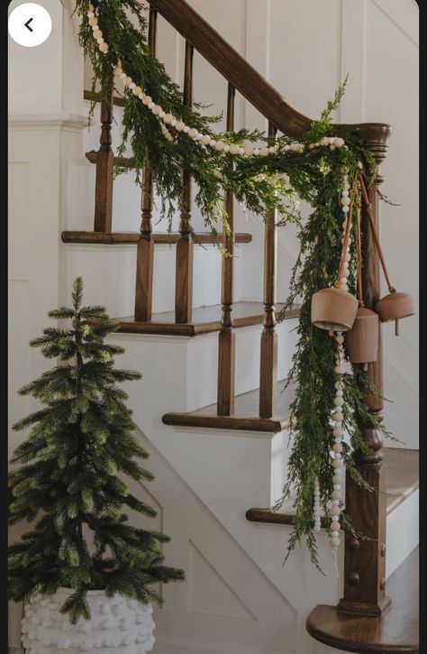 Christmas Decor Hanging From Chandelier, Christmas Coat Hanger Decorations, Stair Post Christmas Decor, Decorate Railing For Christmas, Floating Mantle Christmas Decor, Wreaths On Stair Railing, Garland Stair Railing, Christmas Decor Above Couch, Simple Banister Christmas Decor