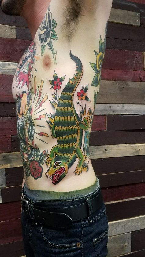 Gator on the ribs done by Derek Herberth at Envision Tattoo in Grand Terrace CA Traditional Rib Tattoo, Ribs Tattoos, Nerd Tattoos, Tattoo Mistakes, Traditional Tattoo Inspiration, Nerd Tattoo, Ribcage Tattoo, Tattoo Graphic, Incredible Tattoos