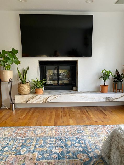 When your fireplace isn’t in the center of the room, balance it out with a floating asymmetrical hearth! Floating Hearth Fireplace, Marble Hearth, Fireplace Hearth, Design Projects, Floating, Fireplace, Cottage, Dream House, Living Room