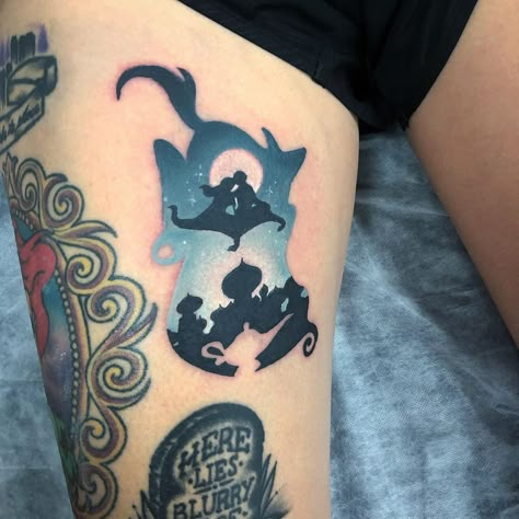 Aladdin Genie Tattoo, Jasmine And Aladdin Tattoo, Disney Aladdin Tattoos, Genie Tattoo Disney, Aladdin Tattoo Ideas, Genie Lamp Tattoo, Genie Tattoo, Aladdin Tattoo, Lamp Tattoo