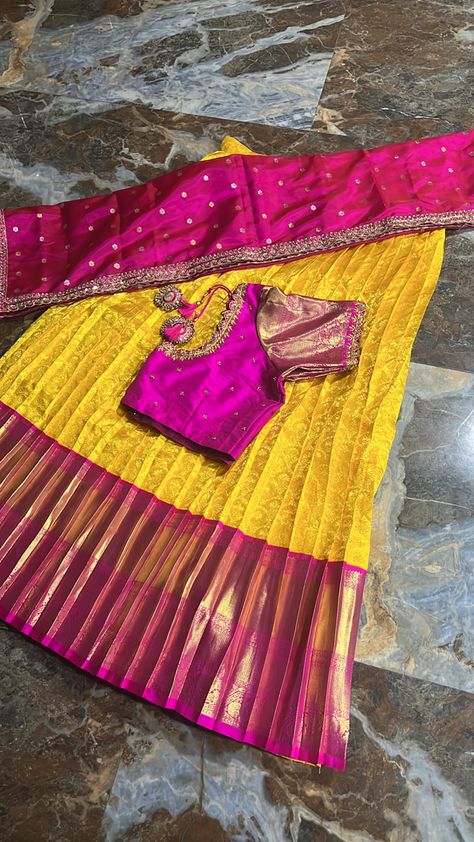 Yellow Kanchipuram lehenga with pink Maggam work blouse paired with pink Kanchi organza dupatta Yellow And Pink Half Saree, Pink Maggam Work Blouse, Kanchipuram Lehenga, Pink Half Sarees, Pink Blouse Designs, Langa Voni, Maggam Work Blouse, Traditional Blouse Designs, Half Saree Designs