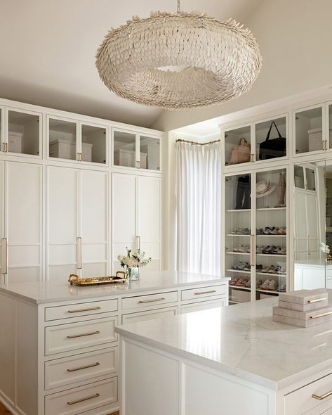 Our Mariposa Chandelier, with its 50” diameter and coco shell texture, creates a stunning ambiance from the dressing room to the bedroom retreat. #Palecek 1. Design: @katiegracedesigns // Photography: @rettpeek 2. Design: @emcyinteriordesign // Photography: @thelaurahenry Coastal Luxe Interiors, Shell Texture, Glam Modern, Bedroom Retreat, Closet Goals, Bed Head, Hendrix, Site Design, Dressing Room