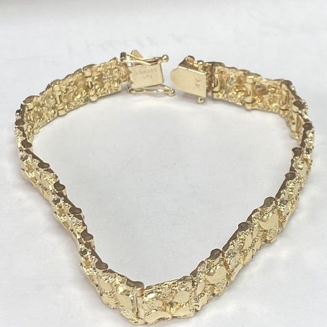 Estate 14k Yellow Gold Nugget Bracelet! Excellent Pre-owned Condition!!! Recently professionally polished, bracelet shows no visible signs of wear. Weight: 27.1g Length: 8” over all Gauge: 9.5mm wide Hallmarked: 14k All items are preowned and might show appropriate signs of age or wear. Item you see in the pictures is the actual item you are getting. lease look at the pictures carefully and use your own judgment before bidding Feel free to Ask any additional questions ALL SALES ARE FINAL NO RETURNS INSURED DOMESTIC SHIPPING ONLY Shipped with USPS First Class Package. Cloth Bracelets, Gold Nugget Jewelry, Custom Gold Jewelry, Dope Jewelry Accessories, Nugget Bracelet, Solid Gold Bracelet, Gold Teeth, Mens Gold Jewelry, Mexican Jewelry