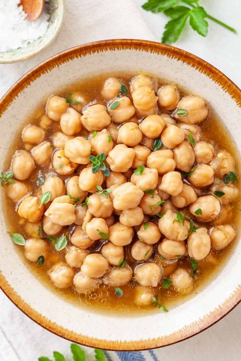 Easy, detailed instructions for cooking garbanzo beans in your pressure cooker, slow cooker or on the stove top. These tested recipes make perfectly cooked, flavorful chickpeas every time. #mealprep #chickpeas #garbanzos #driedbeans #beans #instantpot #slowcooker Cook Garbanzo Beans, Garbanzo Bean Salad, Beans Recipe Crockpot, Garbonzo Beans, Roasted Garbanzo Beans, Garbanzo Bean Recipes, Cooking Garbanzo Beans, Garbanzo Beans Salad, Beans In Crockpot