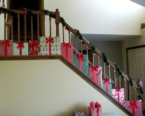 To go with my PRESENTS Christmas theme this year, I came up with this decoration for my staircase. I love it and It will definitely make a statement with my other “present” decorations. Here's how to make it. Christmas Decorating Hacks, Christmas Stairs Decorations, Christmas Stairs, Christmas Staircase, Staircase Decor, Presents Christmas, Stair Decor, Office Christmas, Indoor Christmas