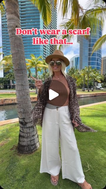 Monica D 🌺 Hawaii 🏖 Beach on Instagram: "Want to rock a stylish cardigan without spending a fortune? * Transform your sarong , pareo or oversized scarf into a trendy cover up ! Just toss it over your shoulders, tie the bottom ends together and voila! You‘ve got sleeves that‘ll keep you warm and looking fabulous! * Comment SCARF for outfit details 🔗  This scarf is $9.97 !" Beach Outfit With Scarf, How To Use A Scarf As A Cover Up, How To Wear A Sarong, Scarf Beach Outfit, Linen Scarf Outfit, Scarf Top Ideas, Dressing Hacks, Scarf Outfit Summer, Scarf Cardigan