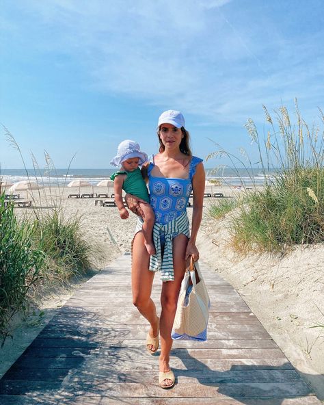 Gal Meets Glam Daily Look featuring Julia wearing Agua by Agua Bendita swimsuit, Olive shirt, Fabletics hat, Rue de Verneuil tote, and Carrie Forbes sandals. Olive Shirt, Julia Berolzheimer, Blue One Piece Swimsuit, Gal Meets Glam, Ruffle Swimsuit, Daily Look, Outfit Details, At The Beach, Spring Summer Fashion