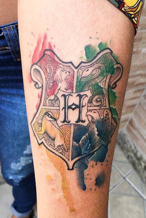 18 Harry Potter Tattoos For True Fans Of The Magical Story | Page 2 of 4 Harry Potter Crest Tattoo, Hufflepuff Crest Tattoo, Hogwarts Crest Tattoo, Harry Potter Always Tattoo, Harry Potter Scar Tattoo, Watercolor Hogwarts, Harry Potter Quotes Tattoo, Watercolor Heart Tattoos, Harry Potter Tattoo Sleeve