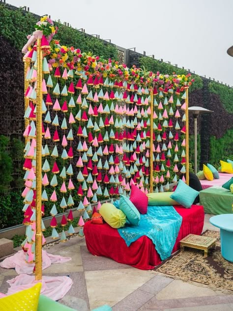 Wish to have such dreamy decor for your wedding too?Click on the link attached below to book a vendor or to get more such wedding inspiration. #indianwedding #shaadisaga #intimatewedding #mehendiceremony #weddingdecor #floraldecor #mehendidecor Mehendi Decor Ideas, Mehendi Decor, Wedding Decor Photos, Wedding Background Decoration, Wedding Entrance Decor, Mehndi Ceremony, Bollywood Party, Mandap Decor, Desi Wedding Decor