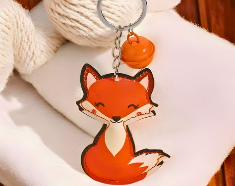 Add a touch of whimsy and elegance to your accessories with our **Genuine Leather Fox Keychain 🦊✨ Expertly crafted from premium leather and featuring a charming cartoon fox design, this keychain is a delightful addition to any handbag or set of keys. The small metal bell pendant adds a playful jingle, making it even more special. ✨Dimensions✨ Length & Width of Charm: 13 cm x 5 cm 📦 SHIPPING & PROCESSING 📦 ✅Processing time will be approximately 1-4 days ✅Shipping time will be approximately 3-1 Animal Bag, Fox Design, Leather Keychain, Fox, Genuine Leather, Birthday Gifts, Gifts For Her, Handbags, Gift Card