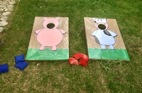 Farm birthday party- corn hole game/feed the pig and cow bean bag toss! So much fun! Games For Farm Birthday Party, Farm Themed Outdoor Games, Cow Birthday Party Games, Cow Birthday Party Activities, Cow Birthday Games, Farm Birthday Activities, Farm Themed Indoor Games, Farm Birthday Party Activities, Feed The Pig Bean Bag Toss