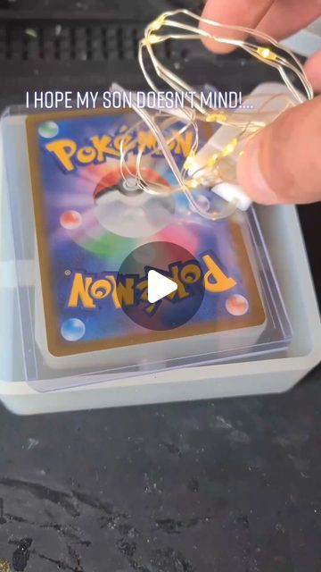 Daniel Cooper on Instagram: "Blast from the past! Pokemon Card In Resin!  This one ramped up 8.5M views and really, really upset the Pokemon Community!..... and the parents of Pokemon collectors! 😂🤣  This is again, why it is important to read video descriptions and the #'s!  The video was planned and it was not my sons card, the last # I used was #it'sajoke but the viewers didn't see it, they just saw what I wanted them to see!  😂😂😂  Resin art, resin, pokemon, pokemon collector, pokemon cards, resin artist, joke  #resinart #resin #pokemon" Resin Pokemon Card, Pokemon Box Diy, Diy Pokemon Card Holder, Pokemon Card Display Diy, What To Do With Extra Pokemon Cards, Pokemon Card Organization Ideas, Things To Do With Pokemon Cards, Pokemon Resin Crafts, How To Make Pokemon Cards