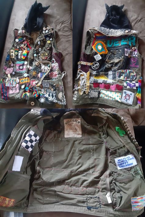 A dark green vest covered in colorful queer and rebellious patches and pins, as well as bits and baubles including old necklaces, can tab chains, charms, keys, buttons, safety pins and fidget toys Punk Vest Ideas, Punk Vest Diy, Battle Vest Punk, Battle Vest Outfit, Battle Vest Ideas, Crust Vest, Alt Jacket, Punk Battle Jacket, Alt Clothes Diy