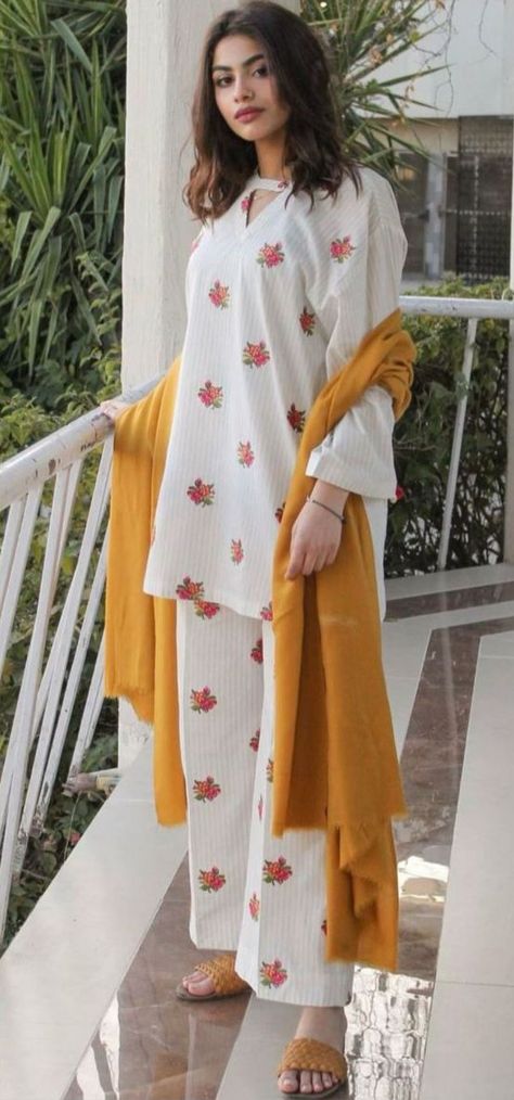 3Pcs Brand:ETHNIC QUALITY: LAWN 90/70 FRONT: Full Heavy Embroidery NECK:Full Heavy Embroidery DAMAN: Full Heavy Embroidery SLEEVES:Full Heavy Embroidery BACK:Plain TROUSER:Full Heavy Embroidery Duppata:Bember Chiffon Duppta Old Price... 3599 ❌ Sale Price 2599 P&D. 200 Free Home Delivery Simple Kurta, Simple Kurti, Pakistani Suit, Front Hair, Trendy Shirt Designs, Dress Book, Pakistani Fashion Casual, Stylish Short Dresses, Pakistani Fancy Dresses