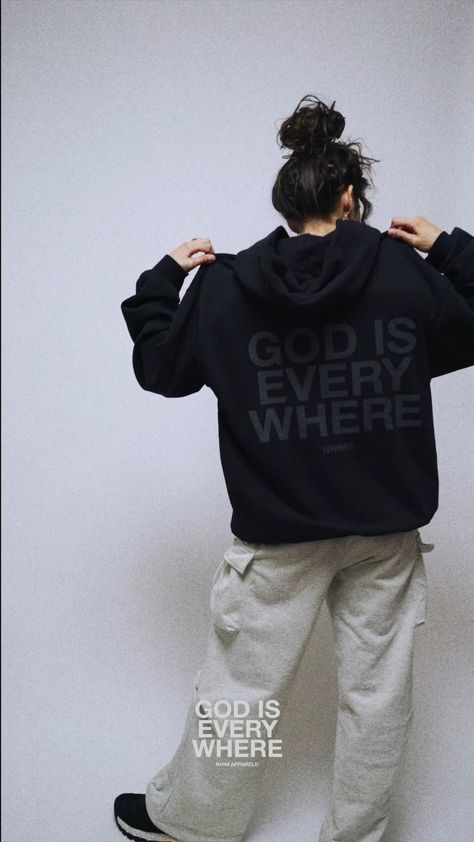 Blackout hoodie with the message "GOD IS EVERYWHERE" is back in stock! Perfect for those who want to show their faith in a stylish way. #godiseverywhere #faith . #Couture #Hoodie_And_Joggers_Outfit_Men #Hoodie_Branding_Ideas #Tshirt_Ads Hoodie Photography, God Is Everywhere, Hoodie Design Ideas, Advertising Clothing, Faith Based Clothing, Desain Editorial, Hoodie Quotes, Christian Fashion, Apparel Brand