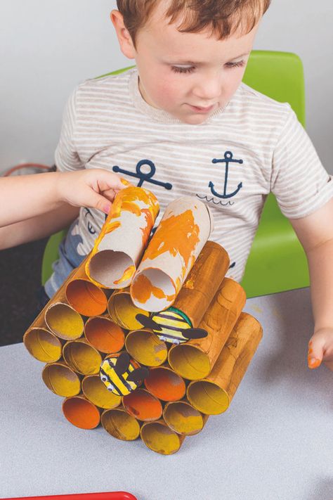 Child making a bee hive craft Construction Eyfs, Minibeasts Eyfs, Work Planning, Mini Beasts, Insect Activities, Bee Activities, Forest School Activities, Eyfs Activities, Pva Glue