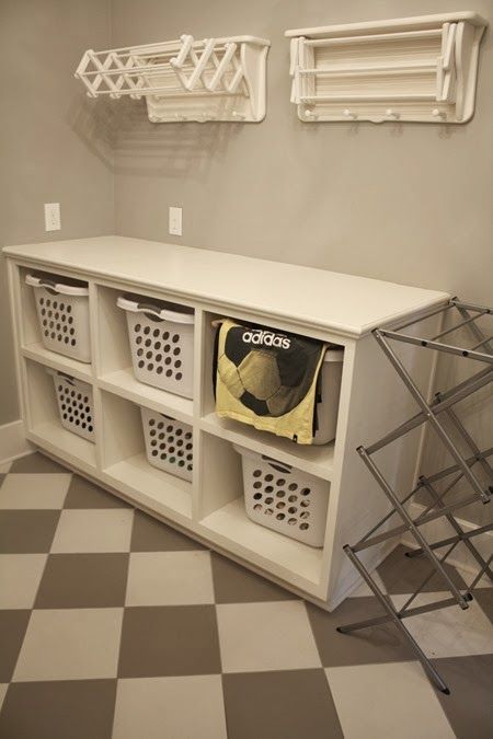 Would love to have a sorting station similar to this with 6 laundry baskets stacked 3 high under the chute.  That way you wash one basket and use the basket for clean folded when done. Organization Basement, Wall Drying Rack, House Laundry Room, Laundry Room/mud Room, Dream Laundry Room, Basement Laundry, Laundry Room Remodel, Laundry Baskets, Laundry Room Storage