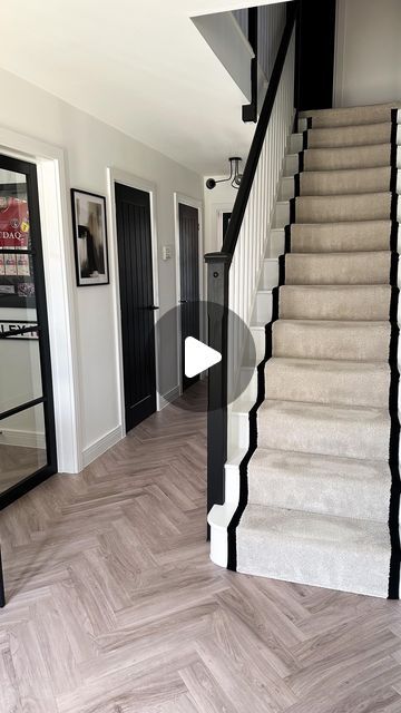 Nicola - The Monochrome Manor on Instagram: "H A L L W A Y 

My favourite transformation, our hallway! 

Carpet & flooring - Carpet Connection (Ordered/fitted)
Carpet - Primo Grande in almond mousse by  STS Flooring 
LVT Flooring - Inspiration in English Oak Grey Beige, Tarkett
Glass door - Leader Doors
Ceiling light - B&Q
Prints - The House Outfit
Black paint (doors & banister) - Loof, Frenchic
Glass console table - Furniture 123
Mirror - William Wood
Wooden ornament - Olivia’s *gifted

#bellway #bellwayhomes #bellwaynewbuild #bellwayhomesnewbuild #bellwayhome #newhouse #newhome #newbuildhome #housebuilding #house #homeaccounts #homeaccountuk #homeaccount  #diyinteriordecorating #diyhomedecor #homesofinsta #newbuildjourney #realhomesofinstagram #housetohome #neutraldecor #monochromedecor Black And Beige Hallway, Neutral Hallway Ideas, Almond Mousse, Leader Doors, Furniture 123, Black And White Hallway, Modern Hallway Design, Paint Doors, Bellway Homes