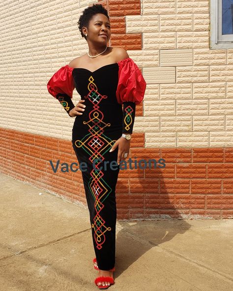 Toghu dress with modern twist. Hand embroidered with colorful yarn. Red bridal satin puff sleeves. #toghu #bamenda @vacecreations on Instagram Facebook: Vace Creations Cameroonian Food, South African Traditional Dresses, Hand Embroidered Dress, Party Wear Gowns, Classy Wear, Traditional Gowns, Traditional Wedding Attire, African Attire For Men, Short African Dresses