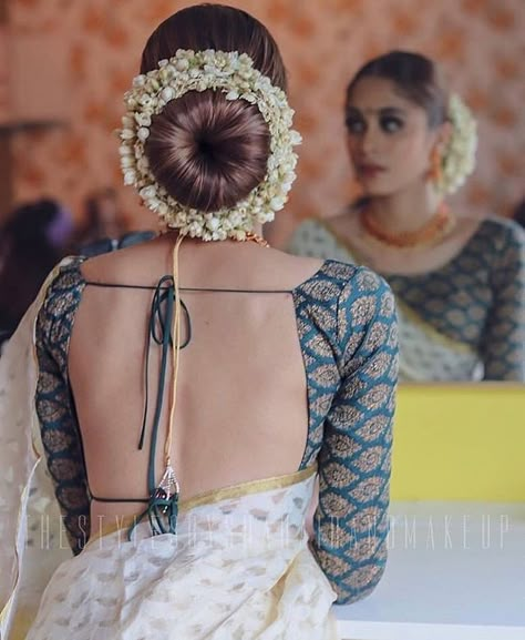 Find the best hairstylist around you  #wedding #indianwedding #hairstyle #bun #gajra #flowers #hairstylist #blouse #backless #shaadisaga Shaadi Lehenga, Indian Hairstyles For Saree, Indian Bun Hairstyles, New Bridal Hairstyle, Hairstyles For Indian Wedding, Bridal Hairstyle Indian Wedding, Hair Style On Saree, Flower Bun, Saree Hairstyles