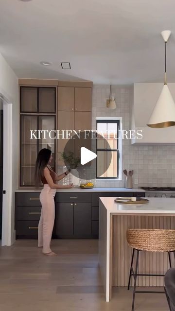 Anewgo Marketplace for New Construction on Instagram: "5 Stunning features we adore about this kitchen! 👇🏻

1. Floating build vent-hood wrap
2. Waterfall kitchen island with a hidden multi-outlet system
3. Iron cabinet doors
4. Backsplash all the way to the ceiling
5. Soft close drawers

Credit: @buildtxsolutions
.
.
.
.

#newhome #newconstruction #newpost" Pole Wrap Kitchen Island, Rounded Island Kitchen, Waterfall Kitchen Island, Waterfall Island Kitchen, Waterfall Kitchen, Pole Wrap, Iron Cabinet, Waterfall Island, Hidden Kitchen