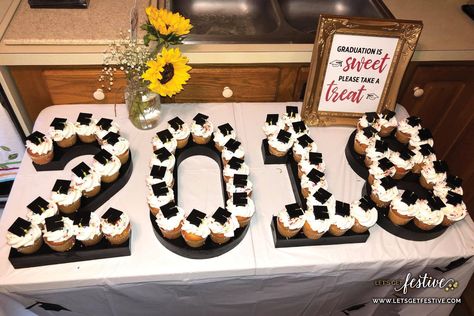 Graduation is sweet, please take a treat Graduation year cupcake stand, 2018 Graduation Party Decor http://www.letsgetfestive.com/decor/other Graduation Cake Display Ideas, 2023 Graduation Cupcakes, Graduation Set Up Ideas Outdoor Parties, High School Graduation Cupcake Ideas, Graduation Dinner Ideas Decorations, Graduation Decoration Table Ideas, Senior Year Graduation Party, Graduation Party Cupcakes Display, Grad Party Sweet Table