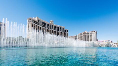 MGM Resorts is selling the famed Bellagio fountains on The Las Vegas Strip—and the building that goes with them—to a real estate investment trust. Honeymoon In The Us, Bellagio Fountains, Vegas Hotels, Bellagio Las Vegas, Cosmopolitan Las Vegas, Real Estate Investment Trust, Las Vegas Vacation, Best Honeymoon Destinations, Vegas Vacation