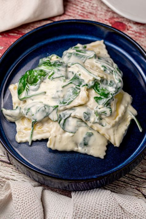 Discover the joys of fast and fabulous cooking with our 10-Minute Creamy Spinach & Cheese Ravioli. A simple yet elegant meal that combines garlic-infused cream cheese sauce with fresh spinach, enveloping each ravioli in a creamy, dreamy embrace. It's the perfect solution for a last-minute dinner that doesn't compromise on taste or quality. Ravioli Sauce Recipe, Cheese Ravioli Recipe, Spinach And Cheese Ravioli, Spinach Casserole Recipes, Pressure Cooker Recipes Chicken, Cream Cheese Spinach, Marry Me Chicken Recipe, Spinach Ravioli, Spinach Casserole