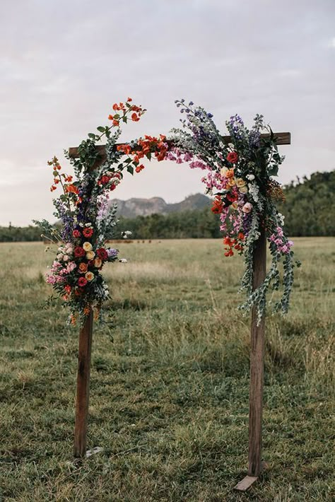 Fall Boho Wedding Flowers Arch, Wooden Flower Wedding Arch, Boho Arbour Wedding, Arbour Flowers Floral Arrangements, Archway Floral Arrangement, Wedding Ceremony Archway, Wedding Arch With Wildflowers, Wedding Arch Flowers Wildflowers, Floral Arrangements Backdrop