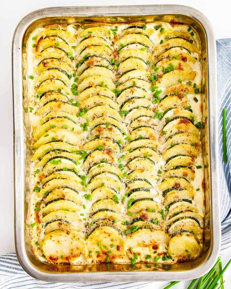 This Zucchini Potato Bake is chock full of goodness - it's creamy and delicious with just the right amount of cheese and spices, giving it lots of flavour! #zucchini #potato #bake #sides #recipe Tender Baked Chicken Breast, Zucchini In The Oven, Zucchini Recipes Baked, Onion Casserole, Zucchini Side Dishes, A Couple Cooks, Chocolate Zucchini Bread, Baked Zucchini, Zucchini Casserole