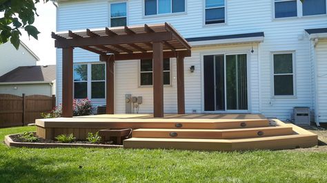 Side Deck With Pergola, Low Deck With Pergola, Decks With No Railings, Low Deck No Railing, Deck With No Railing Design, No Railing Deck, Platform Deck With Pergola, Floating Deck With Railing, Raised Deck With Pergola