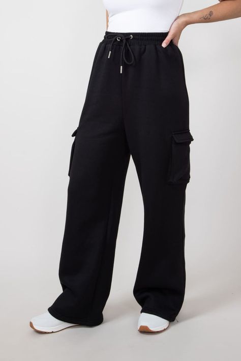 Discover comfort and style with these Drawstring Cargo Sweatpants for Women in Black. Featuring a fleece lining, cargo fit, and elastic tie waistband, these sweatpants will give you ultimate comfort. Pair with your favorite t-shirt and sneakers for the best look!Features:HyfveStyle: HF24E391-BLACKColor: Black30% Cotton 70% polyesterWomen's sweatpantsHigh waist Elastic waistband with drawstring Fleece linedHeavyweight Cargo side pocketsStraight fit Measurements from size small:Waist: 26” Inseam: 28” Hand wash cold, line dryHyfve Size ChartGeneral SizeUS SizingWaist (in)Hip (in)Small226"35"Small427"36"Medium628"38"Medium829"40"Large1030"42"Large1231"44" Cargo Fit, Sweatpants For Women, Cargo Sweatpants, Women In Black, Youth Shoes, Sneaker Slippers, Shoe Boot Sandals, Boutique Tops, Jumpsuit Shorts Rompers