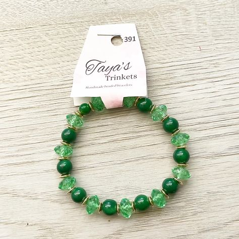 #391 Medium dark green beads, medium oblong green crystal beads, gold disc spacers; single strand bracelet; Cdn $15, shipping extra. Order from tayastrinkets.com . . #handmadebracelets #beadedbracelets #giftideas #greenandcrystalbracelet Gold Disc, Green Beads, Green Crystal, Strand Bracelet, Green Crystals, Green Bead, Handmade Bracelets, Crystal Beads, Dark Green