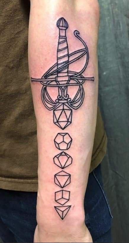 Dungeons and Dragons tabletop polyhedral poly dice rapier sword forearm tattoo Dnd Tattoos, Games Tattoo, Dice Tattoo, Nerdy Tattoos, Famous Tattoo Artists, Nerd Tattoo, D Tattoo, Gaming Tattoo, Viking Tattoos