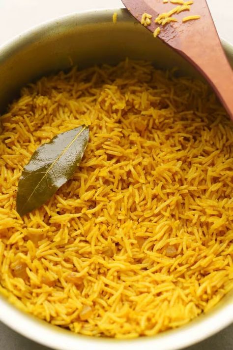 Turmeric Rice (Flavorful Yellow Rice) - Hungry Huy Tumeric Rice, What Is Turmeric, Veggie Kebabs, Turmeric Rice, Vietnamese Soup, Rice On The Stove, Cooking Basmati Rice, Garlic Green Beans, Yellow Rice