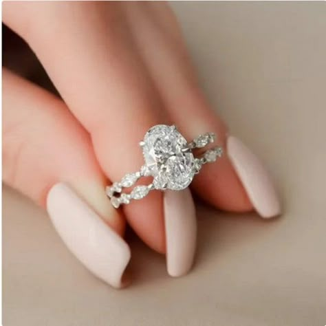 "Description of Ring ● Moissanite Details → Stone Shape: Oval Cut → Center stone carat Weight : 2 CT → Measurement: 9 x 7 mm → Stone Color: Colorless → Stone Clarity: VVS1 → Stone Luster: Excellent → Stone Make: High Quality Material: SOLID 10K/14K/18K GOLD (can be customized in white/rose/yellow gold) , Silver , Platinum ★Why to buy Moissanite over Diamond? Moissanite is pocket-friendly, it is 1/10 of the diamond price. Moissanite is Conflict-free and eco-friendly, were as a diamond can be bloo Moissanite Wedding Ring Set, Cute Engagement Rings, Future Engagement Rings, Oval Cut Engagement Ring, Detailed Engagement Ring, Moissanite Engagement Ring Oval, Oval Engagement, Bridal Engagement Rings, Dream Engagement