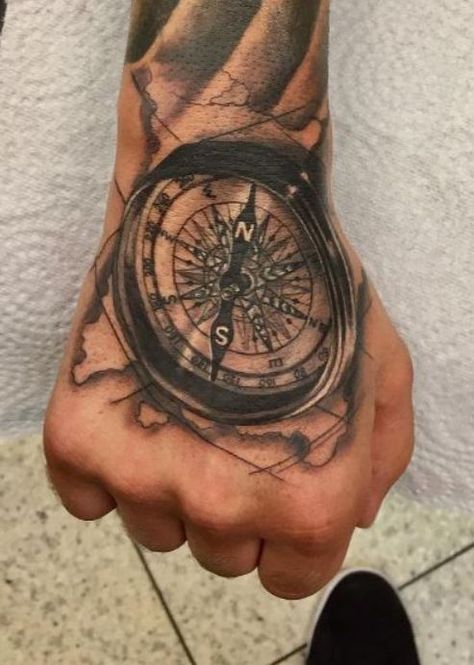 150 Trendy Hand Tattoos for Men You Must See - Tattoo Me Now Compass Hand Tattoo, Hand Tattoo Meaning, Compass Tattoo Meaning, Viking Compass Tattoo, Hand Tatts, Nautical Compass Tattoo, Compass Tattoo Men, Compass Tattoos, Best Compass