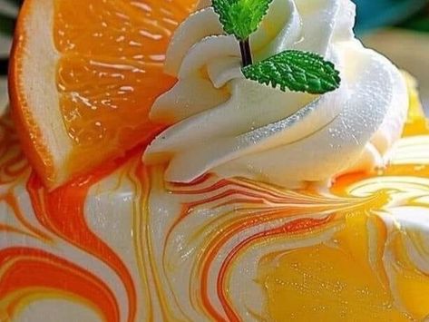 Summery Delight: Southern Pineapple Orange Swirl Cheesecake | Soul Screwed Series | NewsBreak Original Orange Pineapple Swirl Cheesecake, Peaches Cream Cheese, Shrimp Deviled Eggs, Cheesecake Base, Sour Worms, Lemon Butter Salmon, Cream Cheese Cupcakes, Swirl Cheesecake, Cheesy Grits