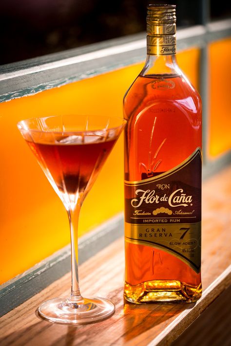 If you thought Manhattan's could only be made with whiskey, get ready to think again. The caramel and spice notes in Flor de Caña 7 rum make it a perfect addition to this stiff standby. Ingredients:-2 parts Flor de Caña 7 rum-1 part sweet vermouth-1/6 parts maraschino liqueur-1 dash orange bitters Directions:Add all ingredients to mixing glass filled with ice. Stir vigorously and strain into a chilled martini glass. Garnish with a cherry. Recipe courtesy of Flor de Caña   - ELLEDecor.com Easy Rum Cocktails, Best Rum Cocktails, Rum Cocktails Easy, Cherry Recipe, Maraschino Liqueur, Glass Garnish, Good Rum, Orange Bitters, Sweet Vermouth