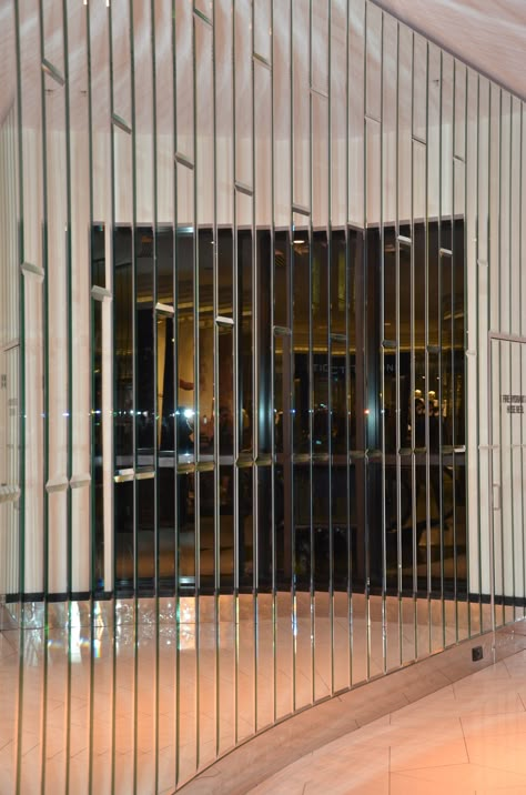 Mirror Wall Decor Restaurant, Mirror Strips On Wall, Glass Wall Panelling, Bronze Mirror Panelling, Art Deco Wall Panelling, Bevelled Mirror Wall, Bronze Mirror Wall, Mirror Wall Ideas, Emerald Interior