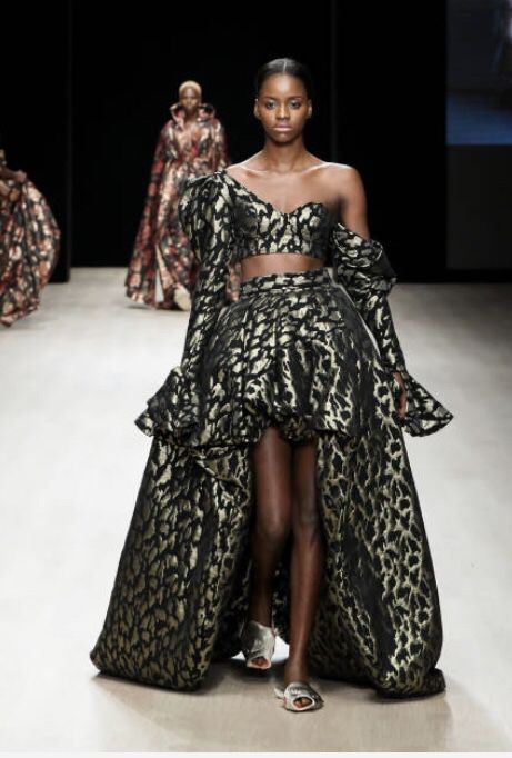 A model wearing Selam Fessahaye walks the runway during Arise Fashion Week on April 19, 2019 in Lagos, Nigeria. #TheStreetStyleR #ontherunwayafrica #selamfessahaye Models Runway Walk, Selam Fessahaye, Runway Walk, Model Runway, Lagos Nigeria, Role Model, April 19, High Low Dress, High & Low