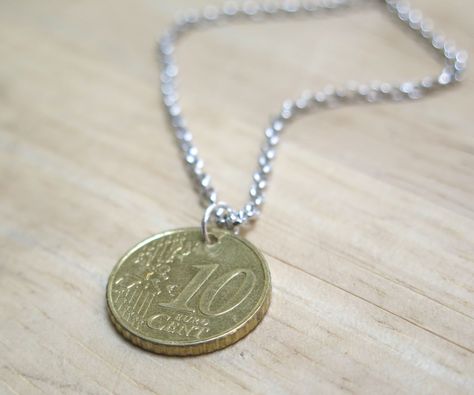 Last winter, one of my best friends and I went traveling through Europe together. It was definitely a memorable experience and for her birthday this year, I wanted to give her a memento from our awesome vacation. I had this 10 cent coin from our trip that I turned into a cute necklace for her to wear and remember our all the fun adventures we had. This is a simple, heartfelt gift that makes a unique and inexpensive souvenir for any trip! Coin Jewelry Diy, Coin Jewelry Necklace, Traveling Through Europe, Coin Crafts, Silver Eyeliner, Coin Ring, Coin Jewelry, How To Make Necklaces, Cute Necklace